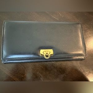 EUC Salvatore Ferragamo black leather long wallet with brass hardware